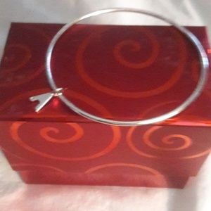 Silver bangle bracelet .